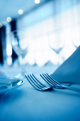 blue wedding table setting with forks