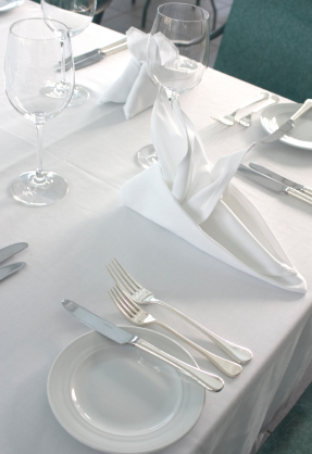 white table linen and table setting