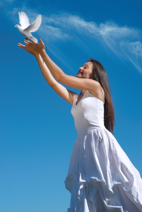 bride releasing a dove