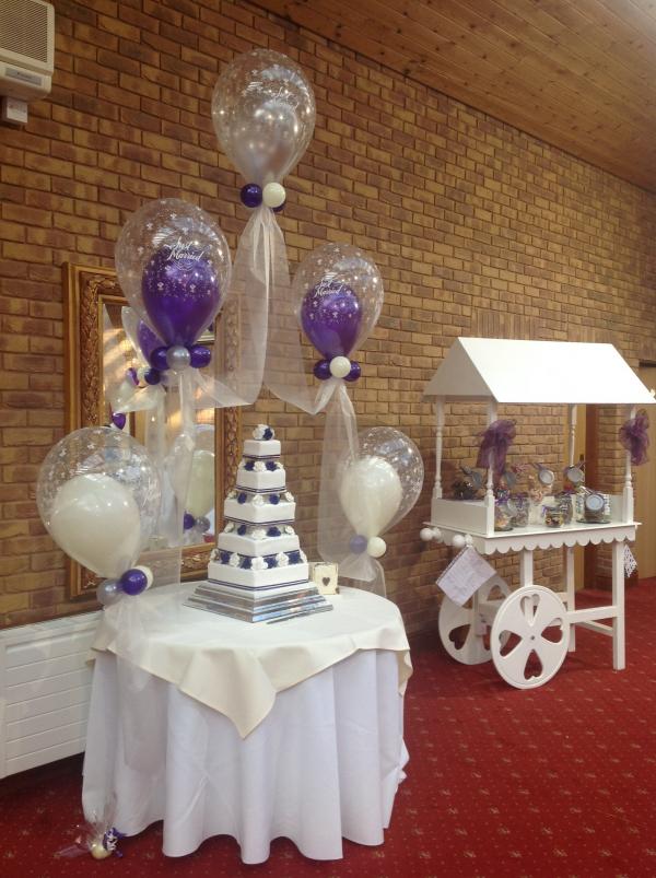 wedding balloons and sweet cart or candy cart