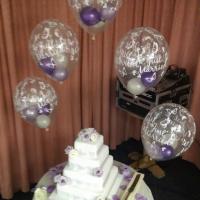 ballon arch over a cake table
