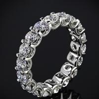 Claw Set Wedding Ring With Round Diamonds.