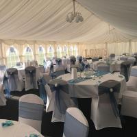 Hopwas Cricket Club marquee dressed in teal with giant love