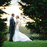 wedding couple in the grounds of the abbey hotel redditch