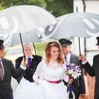 Bride arrives in rain to get married