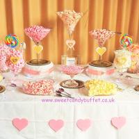 Pink wedding pick and mix sweets candy buffet cart