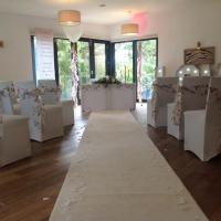 Hothorpe Hall Woodlands with our beautiful floral sashes and aisle runner to lead the way