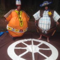 Cowboy and Indian sumo wrestling suits