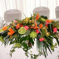 Anthuriums, Orchids and Strelitzia, Tropical themed top table arrangement