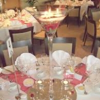 Wedding centrepiece martini glass vase and floating candles