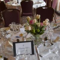 oak farm table setting for a wedding